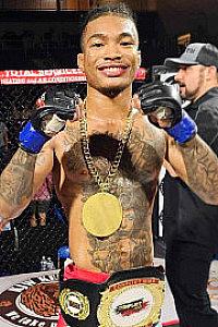 UFC’s Malcolm Wellmaker Inspires Kids by Embracing His Inner Superhero