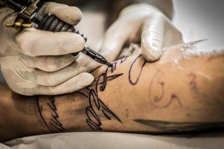 Epic Leg Tattoo Unites Conor McGregor, Tyson, Ali, Jon Jones, and Fury in One Stunning Design